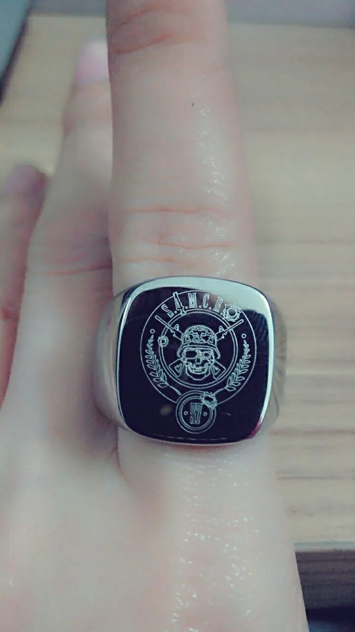 ring with logo