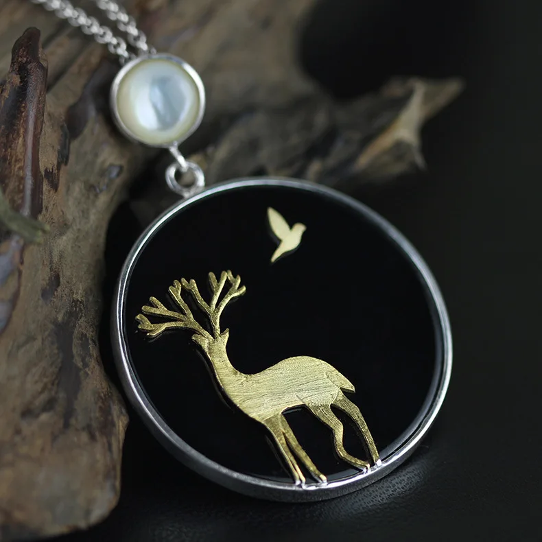 

927 Sterling silver deer with bird black agate pendant To do a sweater chain pendant Women act the role ofing is tasted