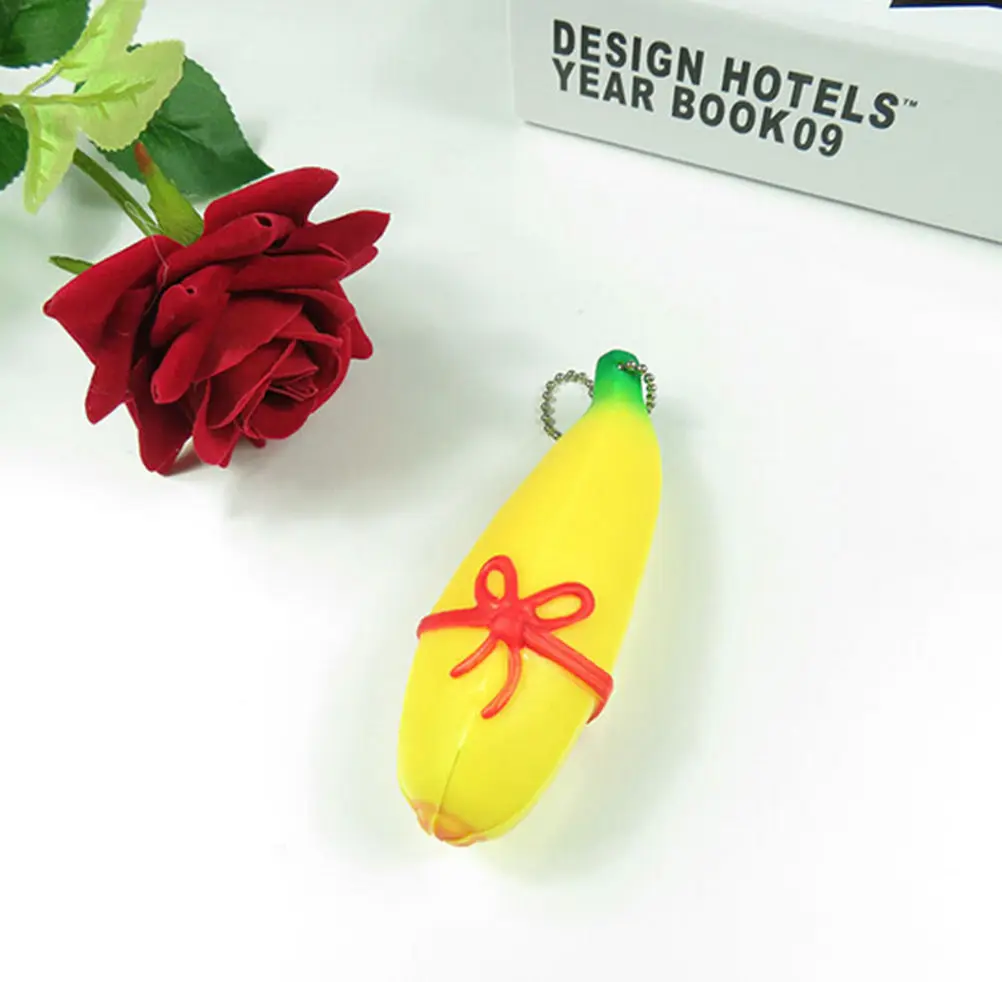 1Pcs Funny Silicone Fruit Banana Stress Reliever Keychain Decompression Vent Novelty Gaps Toy Red black bow