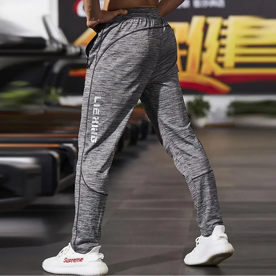 US $12.99 40% OFF|New Fitness Men Joggers Sweatpants Thin Gray Sportswear Jogger Pants Men Casual Trousers Men Gyms Bodybuilding Track Pants in US $12.99 40% OFF|New Fitness Men Joggers Sweatpants Thin Gray Sportswear Jogger Pants Men Casual Trousers Men Gyms Bodybuilding Track Pants in