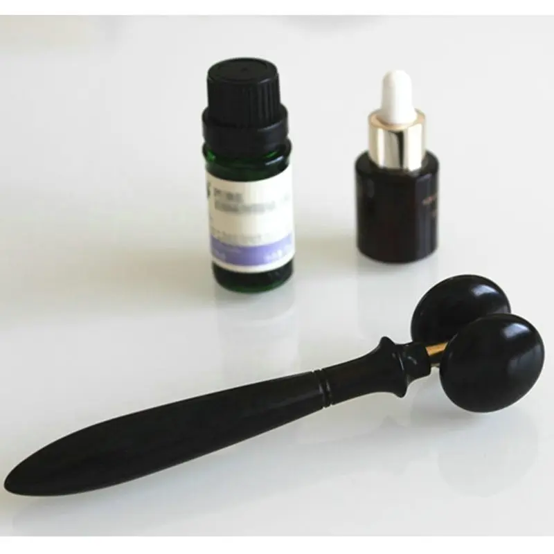 Ebony Facial Eye Massager Roller for Joint Meridian Acupressure - Finger Massager Wheel Activity image 4
