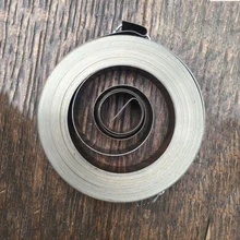 Mola retrátil da bobina da torsão do fio plano da força constante da alta precisão, largura * 0.25mm comprimento * 45mm, 5000mm * 8mm diâmetro fora