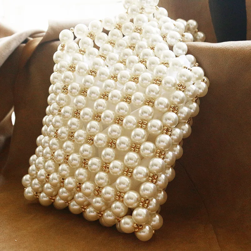 

Super seabob 2018 New Design Fsahion Metal Pearl Manual Weave Handbag Concise Casual Small Mobile Phone Bag Women DA319