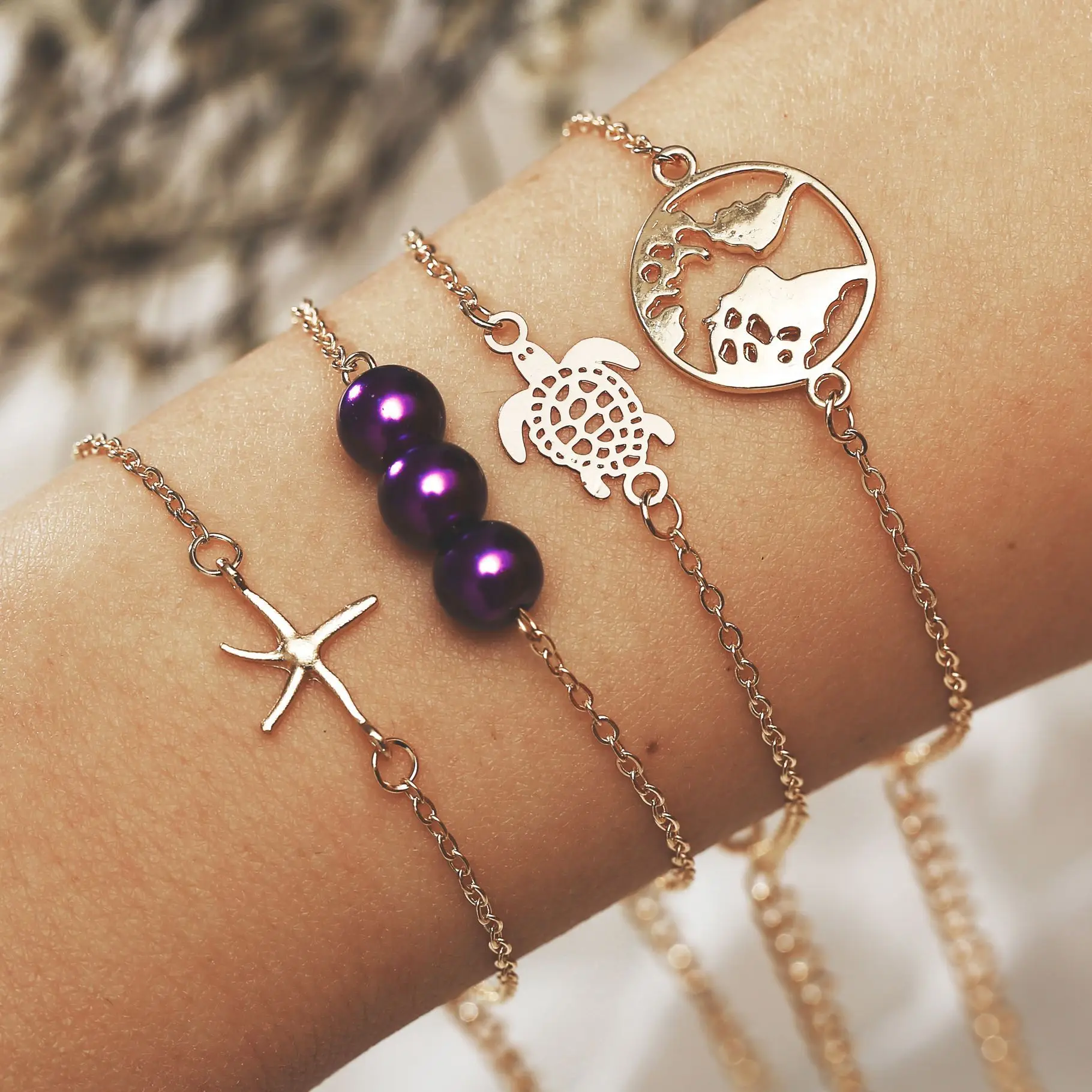 

Simple natural four-piece turtle map lady bracelet suit