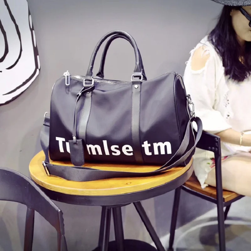 

Female handbag luggage bag portable travel bag men 's travel bag large luggage baggage