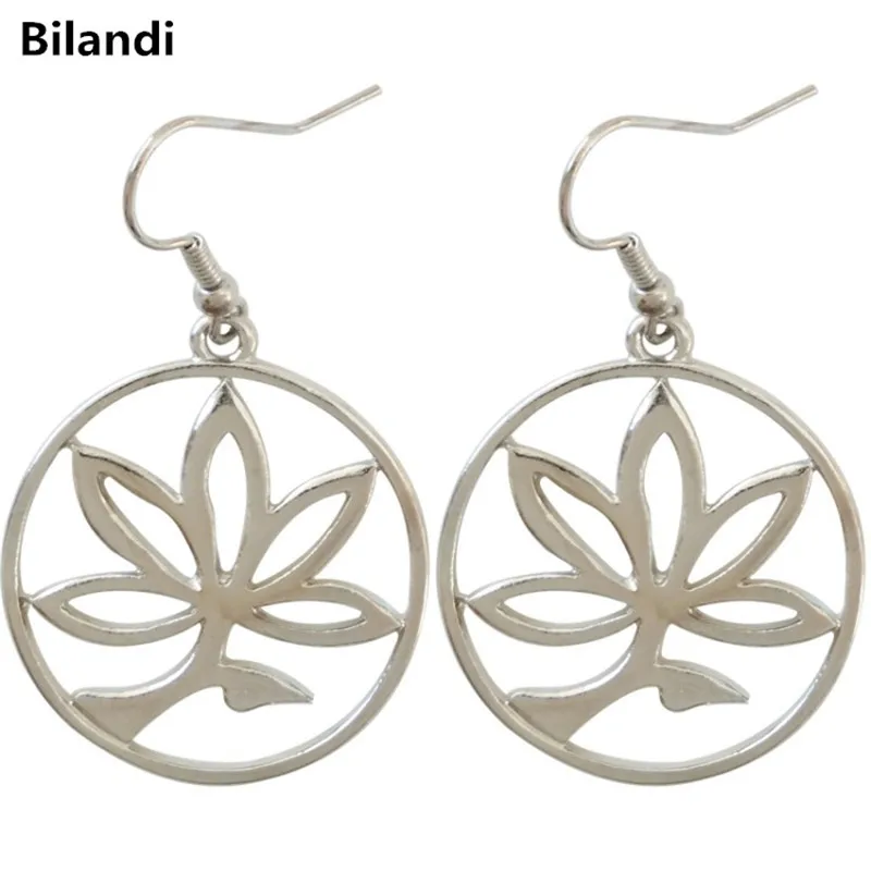 

Simple personalized hollow circle coconut tree earrings for woman jewelry design
