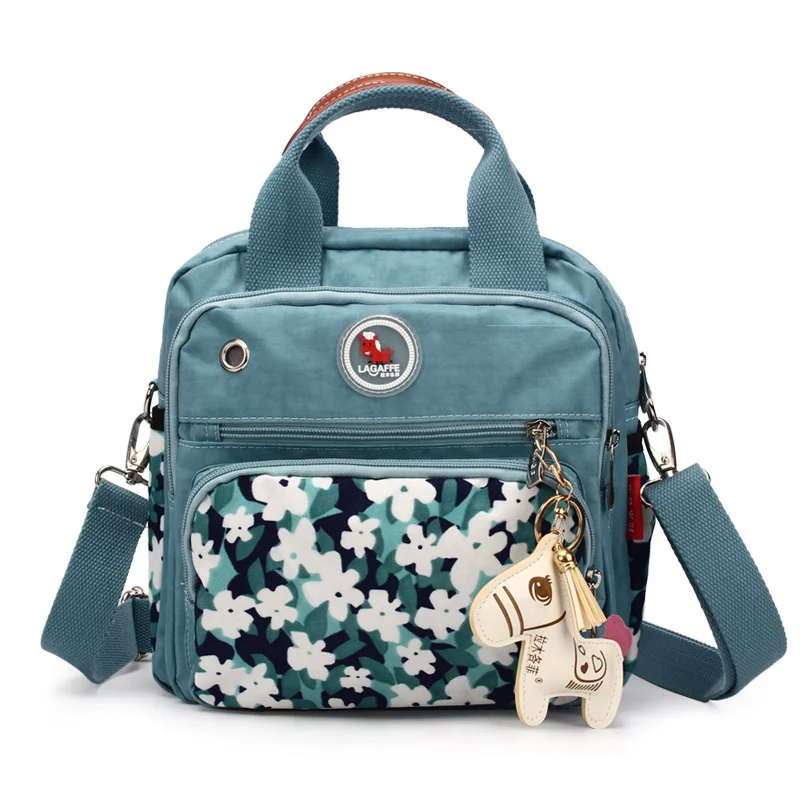 

Creative Blue Flower Design Diaper Bag For New Born Infant Portable Waterproof Nylon Maternity Bag 1pcs Easy Tidy Mommy Bag