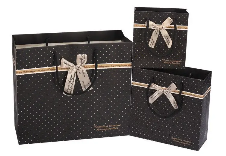 

Emerra Hot Selling European Gift Bag Black Spotted Hand-held Paper Bag Clothing Cosmetics Packaging Bag Wholesale Bread box