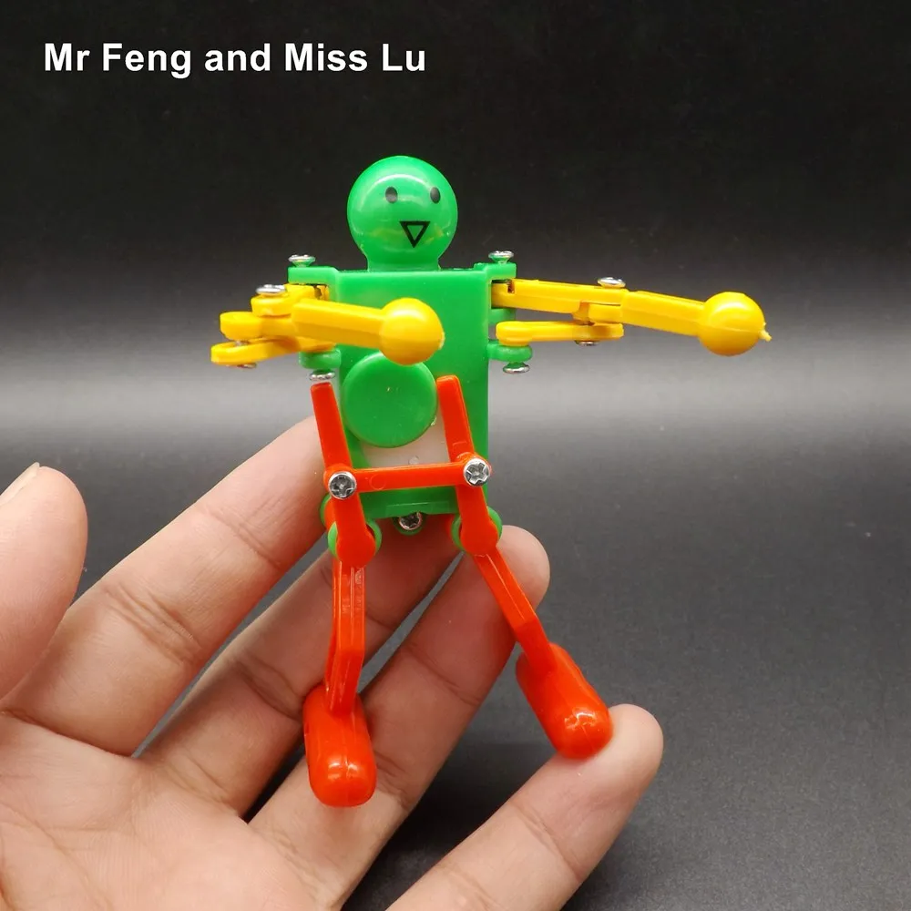 Dancing Robot Toy Plastic Clockwork Spring Wind Up Dancing Robot Kids Funny Gift