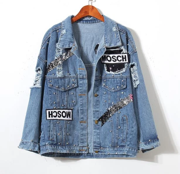 denim jacket with pins and patches