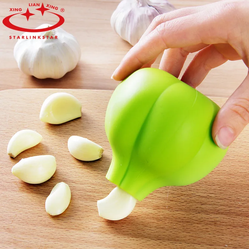 

Starlinkstar 1pc Garlic Peeler Peel Silicone Creative Practical Kitchen Magic Tool garlic stripper tube Peeling Free Shipping
