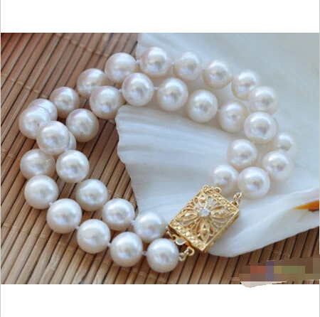 

Free shipping >>>>>>P3913 2row 8" 11mm round white freshwater pearl bracelet