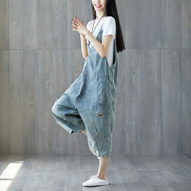 

Johnature Vintage Solid Color New Women V-Neck Sleeveless Denim Jumpsuits 2019 Summer Casual Hole Calf-Length Jumpsuits