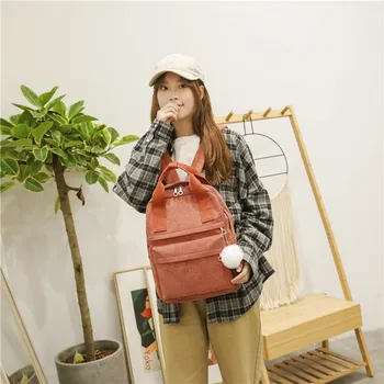 

Manufacturers custom new fashion simple travel backpack female Korean version of college style fluff ball backpack creative