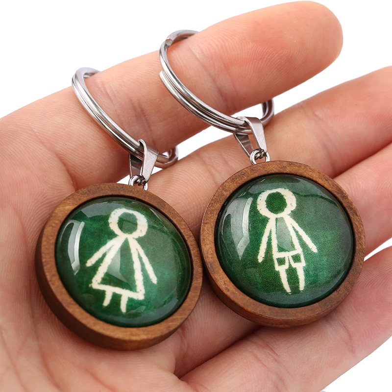 reidgaller Glow in the dark glass cabochon key chain 25mm round wood