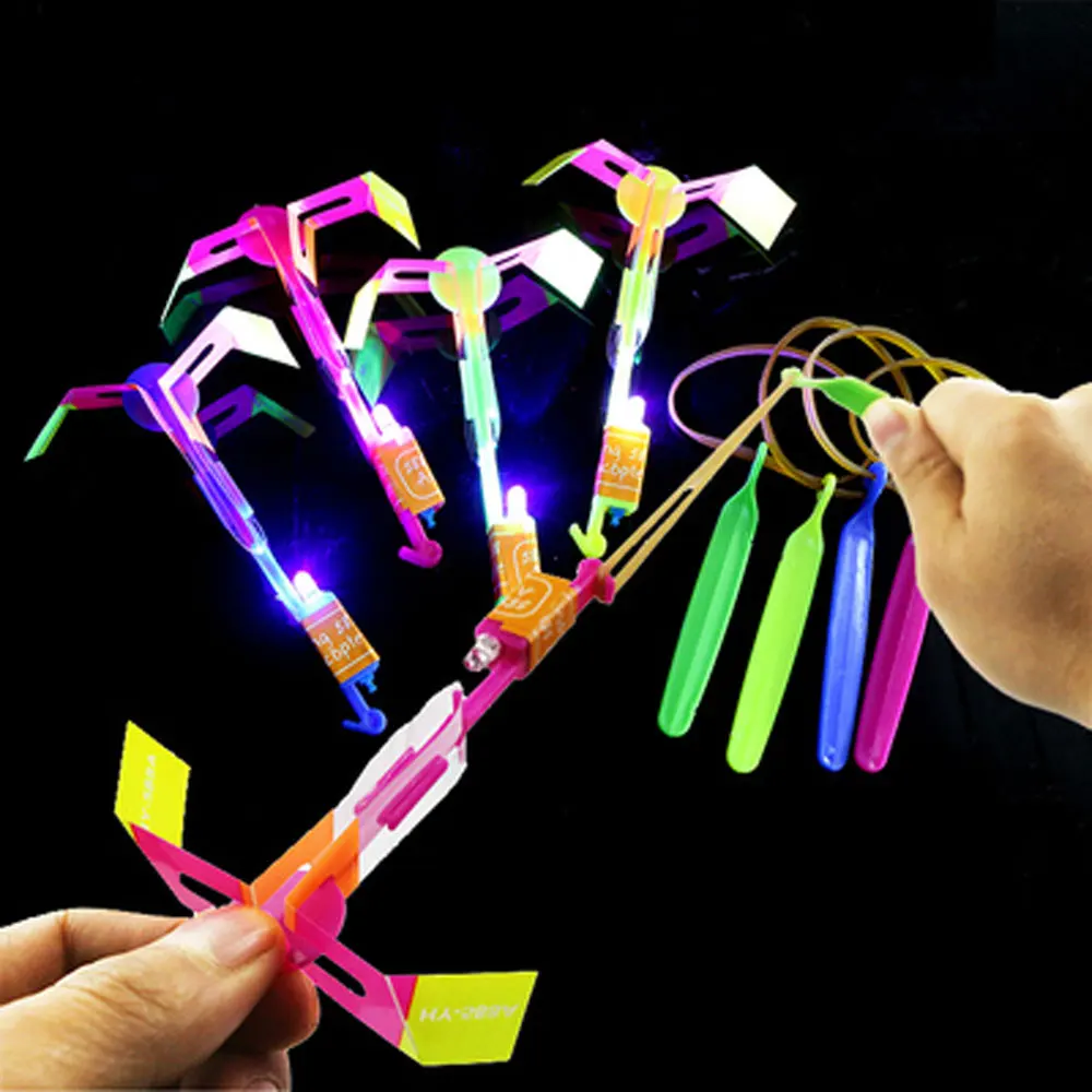 

25/50/100Pcs Glowing Toys For Children Flying Toys Slingshot LED Copter Lighting Up Toy Arrow Helicopter Luminous Rocket Gifts