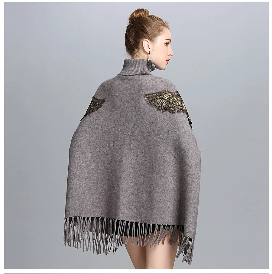 ZDFURS* Autumn Winter Long Knitted Women Eagle Appliqued Sweater Fashion Long Batwing Sleeves High Neck Stole Tassel Poncho