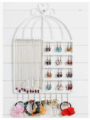 Creative, wrought iron hand necklaces earrings benchs