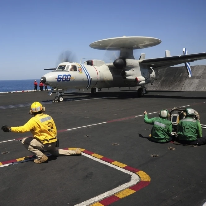 An E-2C Hawkeye launches from the flight deck of USS Dwight D. Eisenhower Poster Print (34 x 22)