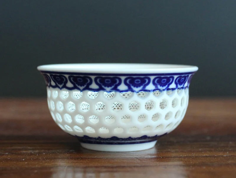 Exquisite Openwork ceramic cup Chinese traditional porcelain teaCup Kung Fu Teacup Tea accessories green tea cup 1pcs
