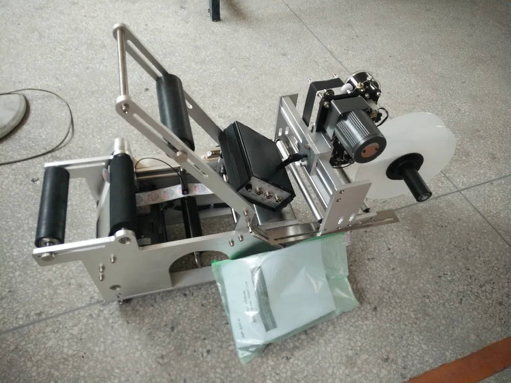 

Customized semi-automatic round bottle labeling machine, label sticker, lalbeler MT-50D+Free shipping
