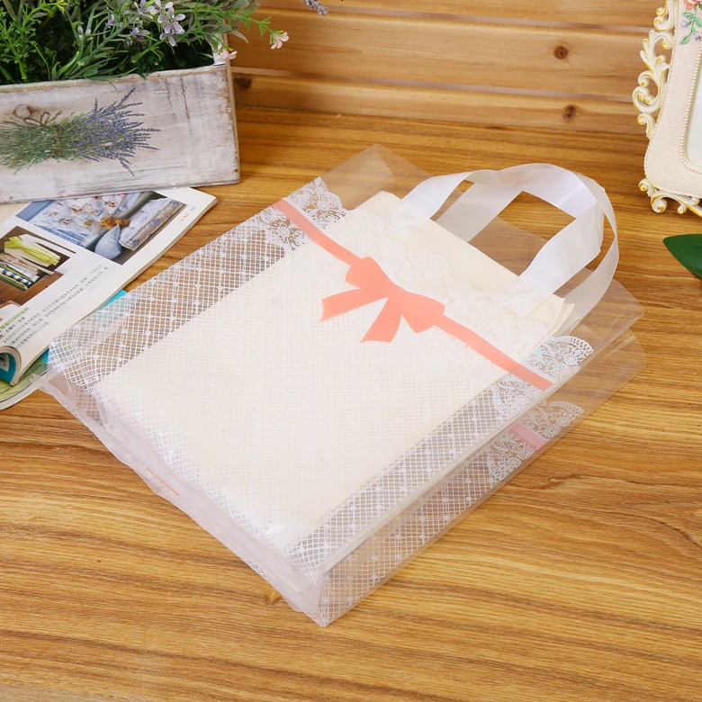 

50pcs/lot White Lace Transparent Bag With Handle Pink Bow Plastic Bags Clothes Supermarket Shopping Bag Wedding Party Gift Bag