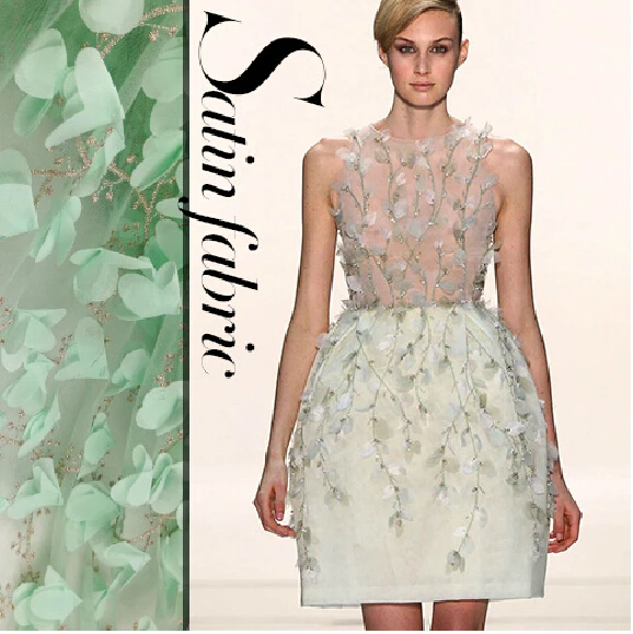 

Heavy gold thread embroidery green chiffon three-dimensional flower Lei Sibu customized high-end apparel fabrics