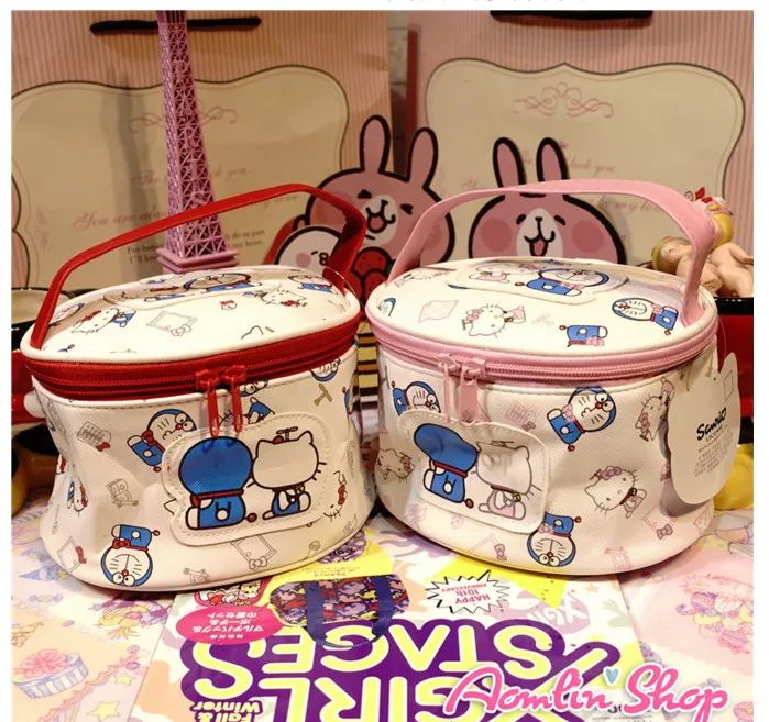 

2017 new Sanrio hellokitty portable bag machine cat door free makeup bag with travel Barrel-shaped