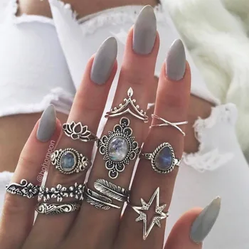 

pack of 11 personality knuckle rings with embossed flower /stars and faux gem design in burnished