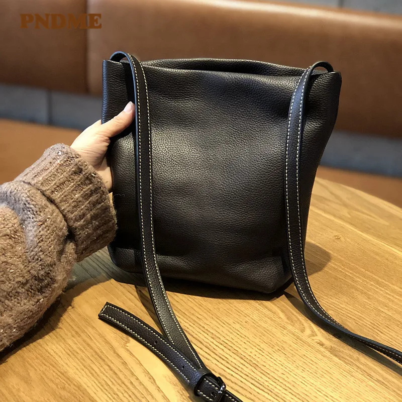 

PNDME casual genuine leather black ladies shoulder bag cowhide leather simple bucket bag fashion women's cross messenger bags
