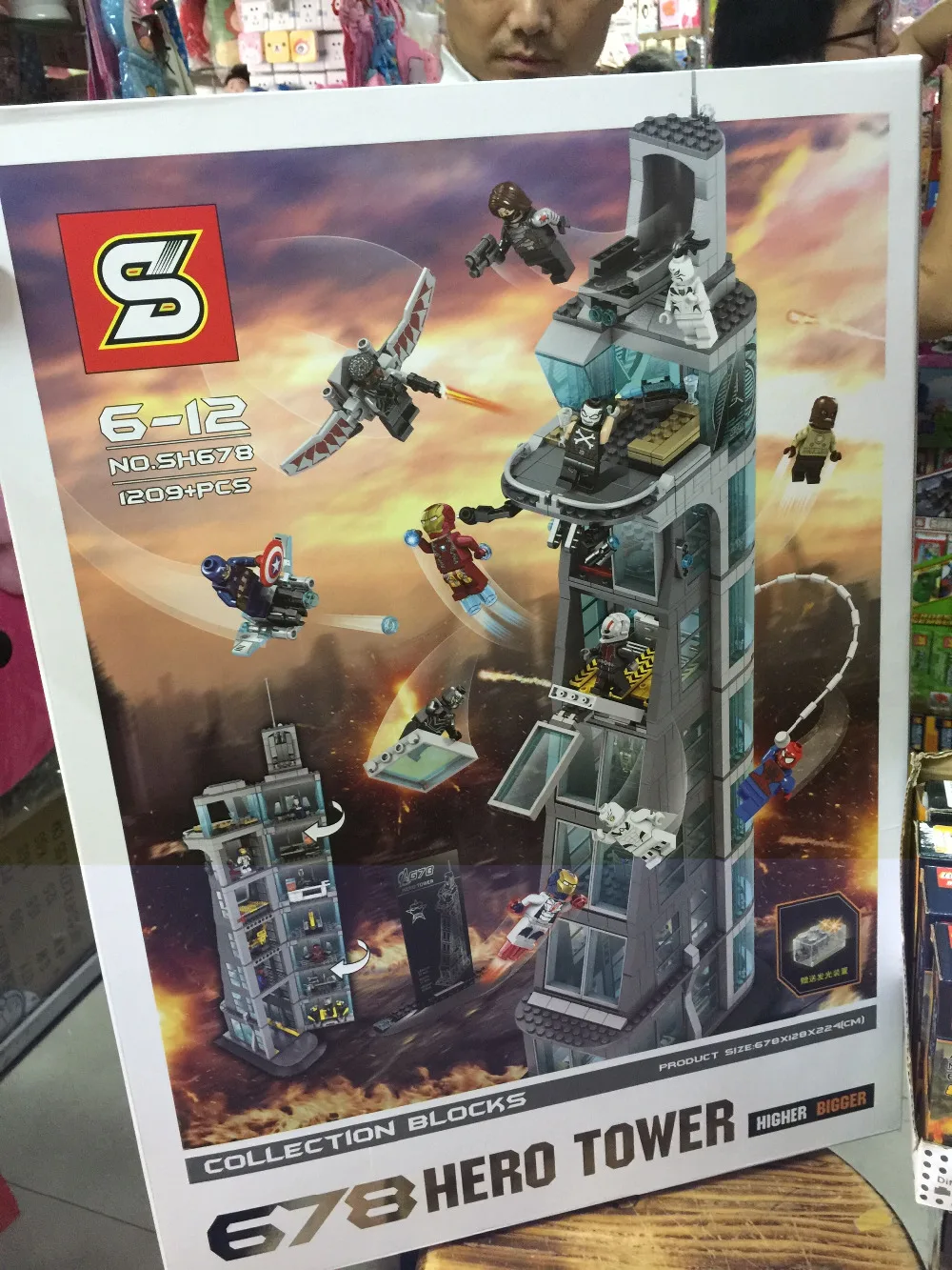 

SH678 in stock 1209Pcs Upgraded version Super Hero Attack On Avenger Tower Model Building Kit Blocks Brick Toy Compatible Gift