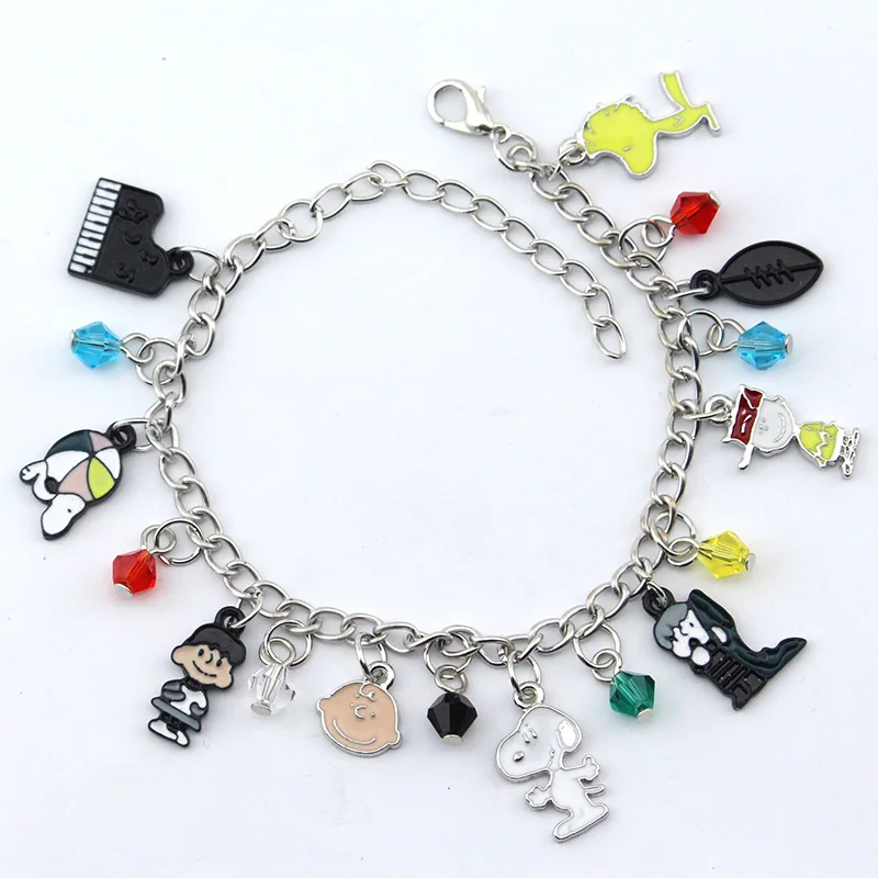 

Peanuts Charlie Brown 9 Themed Charms Assorted Metal Charm Bracelet