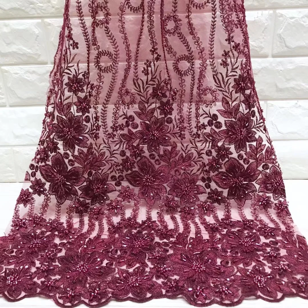 

Beautifical african fabrics Latest handcrafted beaded net lace fabric for dress High quality nigerian lace with sequins ML5N359