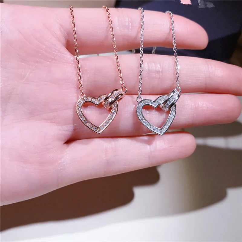 

Korean fashion fresh sweet S925 pure silver joker double heart cross heart necklace jewelry female