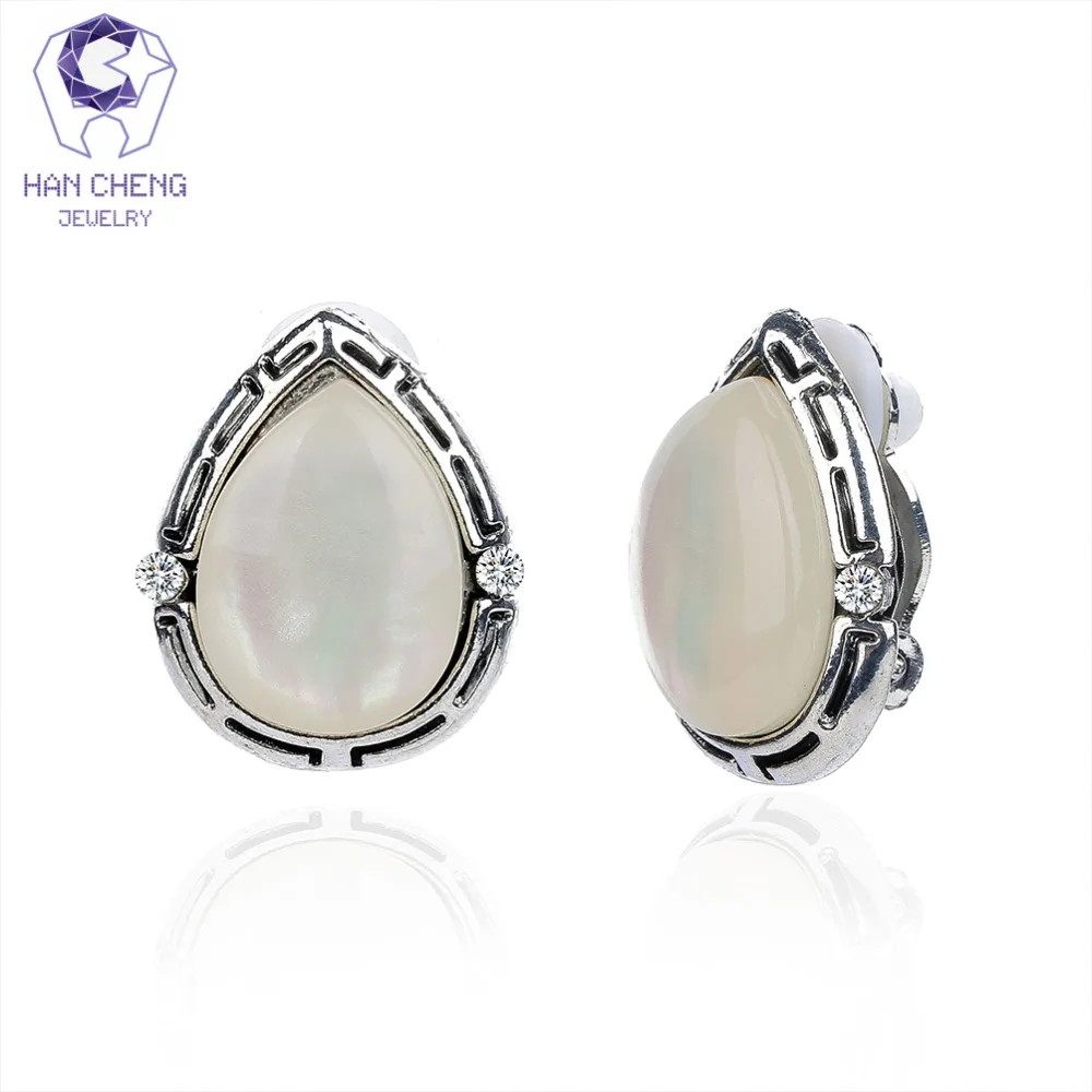 

HanCheng New Fashion Zircon Oval Fire Opal Ear Clip Vintage Clip Earrings For Women Jewelry Antique Silver Plated bijoux brincos