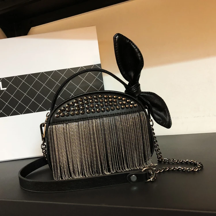 

2019 New Pattern Bow Ears Package Korean Personality Tassels Single Shoulder Handbag Half A Month Saddle Messenger Packet Woman