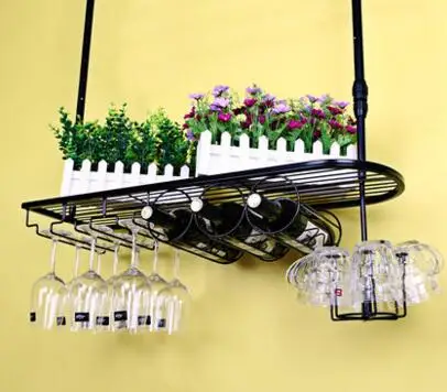 Hanging glass frame. The bar wine rack.