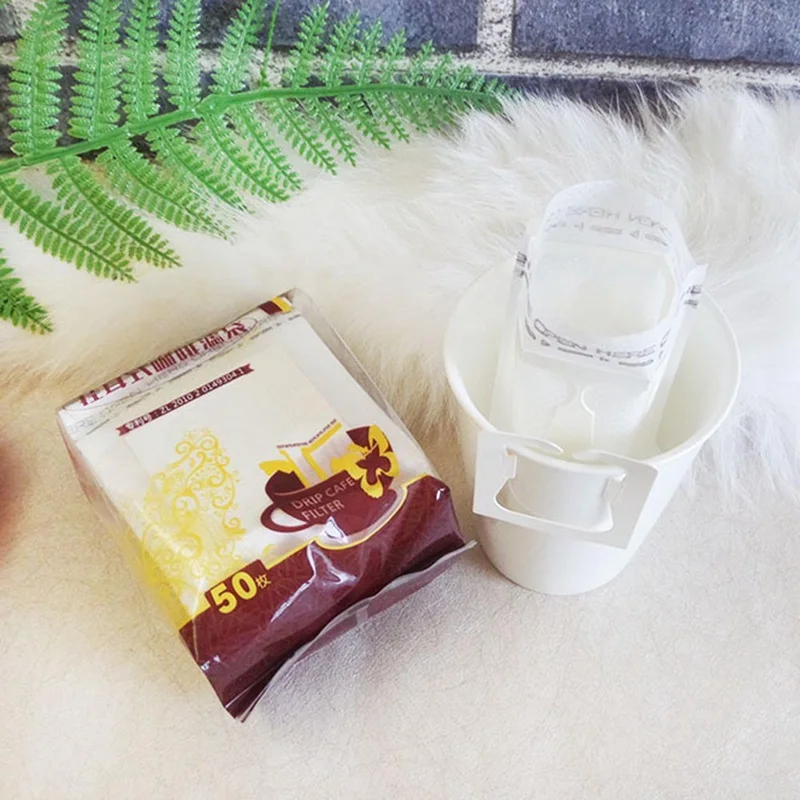 

25Pcs / Pack Drip Coffee Filter Bag Portable Hanging Ear Style Coffee Filters Paper Home Office Travel Brew Coffee Bolsas de te