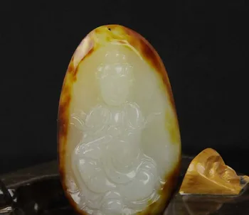 

Xinjiang Hetian jade Guanyin pendant pendant super red jujube seed material