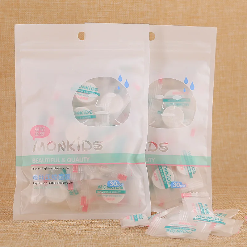 

Facial silk compression mask paper ultra-thin breathable independent packaging disposable silk compression mask 30 tablets