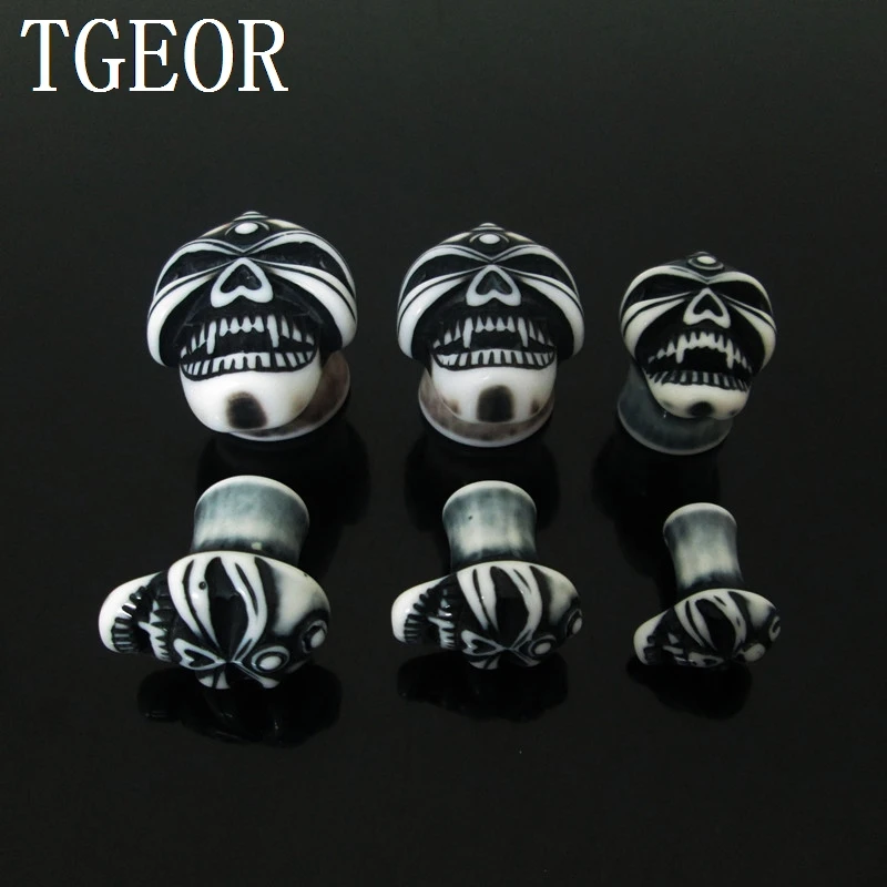 

FREE SHIPPING 1pair ear expander COLORS skull resin ear plug Fashion HIGH QUALITY