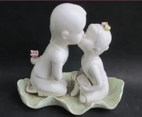 

Crafts statue Ancient Chinese ceramics. Kiss for child kiss Adornment