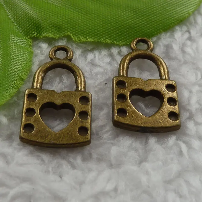 220 pieces antique bronze lock charms 22x12mm 4109in Charms from
