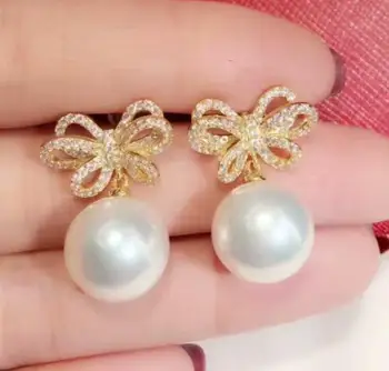 

charming pair of 10-11mm south sea round white pearl earring 925s
