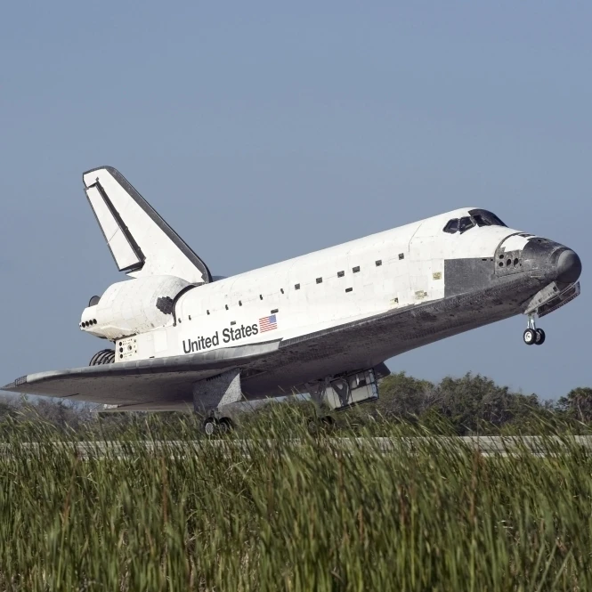 Space shuttle Atlantis touches down on Runway 33 at the Kennedy Space Center in Florida Poster Print (17 x 11)