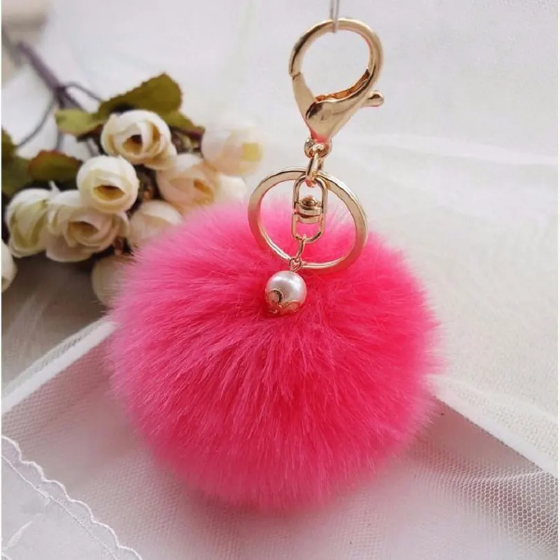 lv pom pom keychain