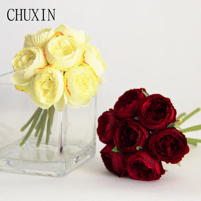 

Bride holding bouquet artificial flowers silk rose Lulian wedding fake flower wall party hotel home decoration photography props