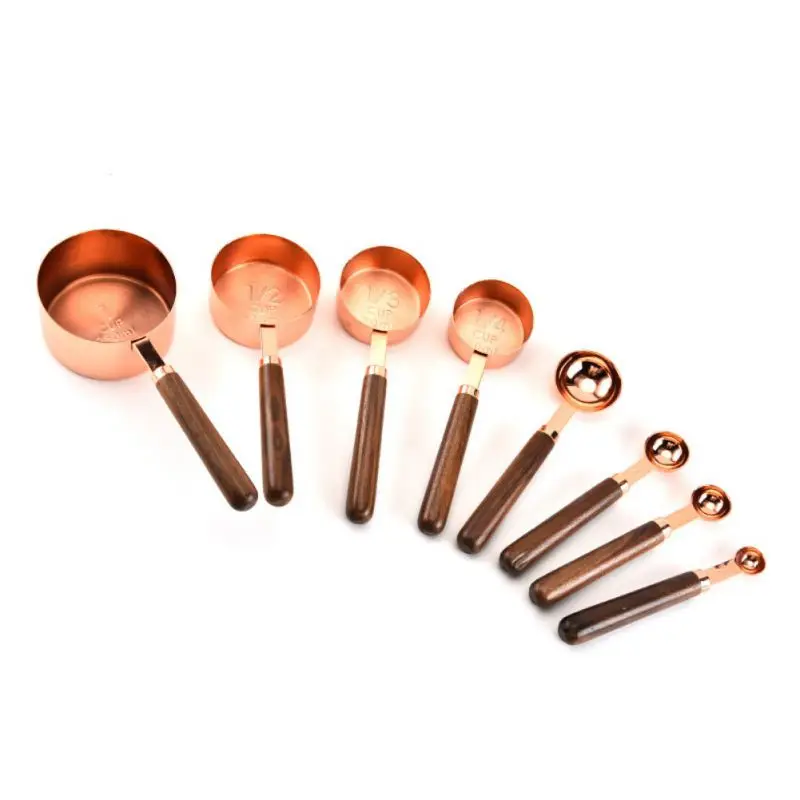 

4 Copper-Plated Stainless Steel Measuring Cups/Spoons With Wood Handles