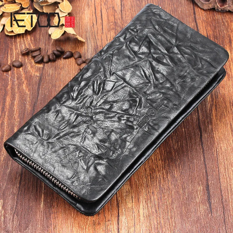 

AETOO Cowhide hand folds long zipper wallet retro leather zipper men and women wallet features Clutch trend