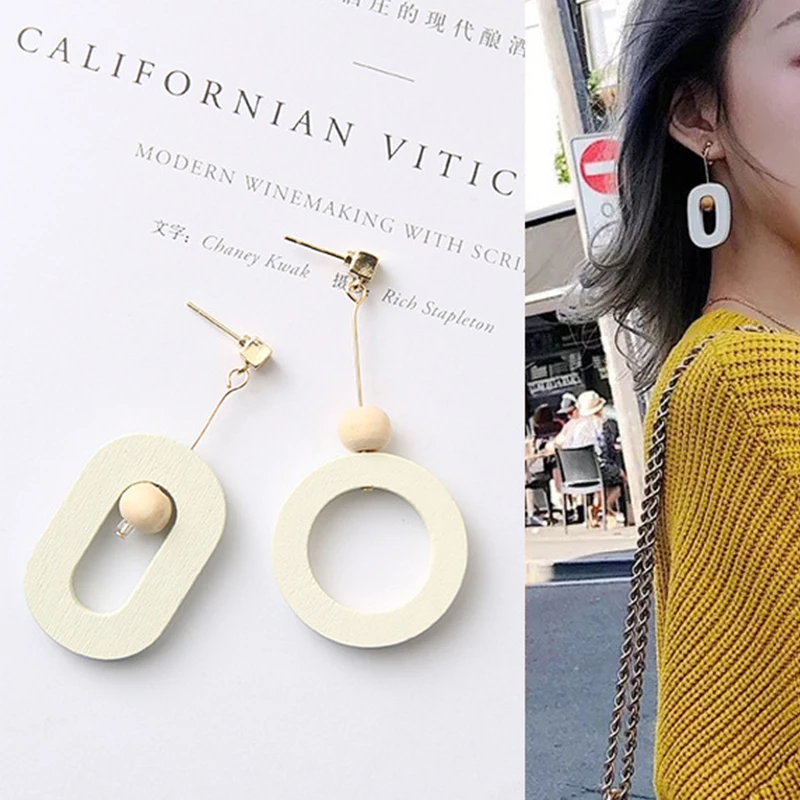 

2019 New Fashion Hollow Wooden Roound Oval Geometric Asymmetrical Dangle Earrings Simple Ball Drop Earrings for Women Jewelry
